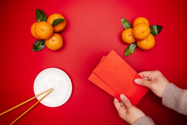 Photo high angle view of person holding fruits