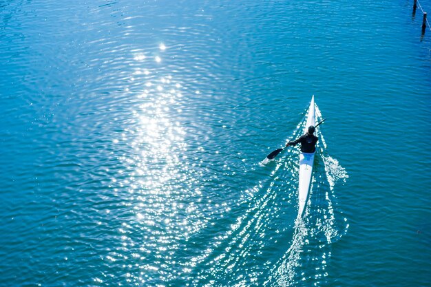 High angle view of person kayaking on sea