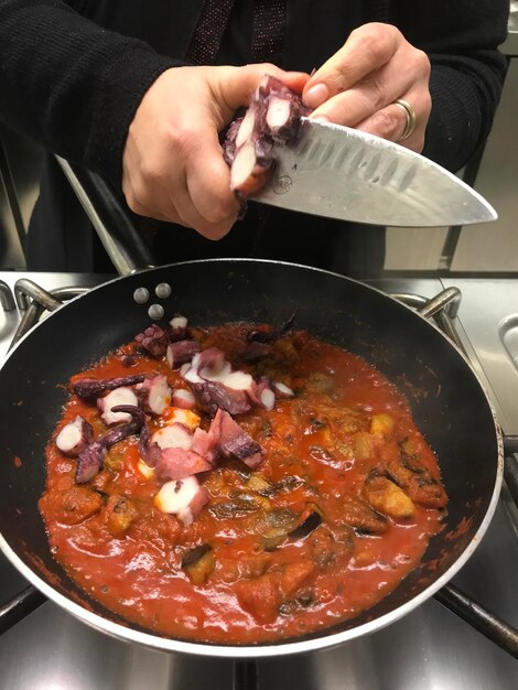 High angle view of person preparing food in kitchen