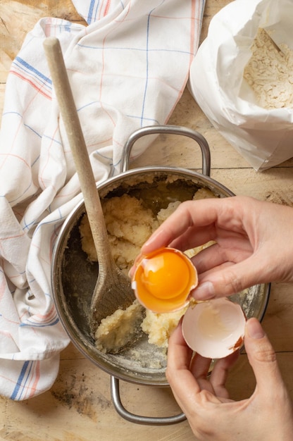 High angle view of person preparing food on table