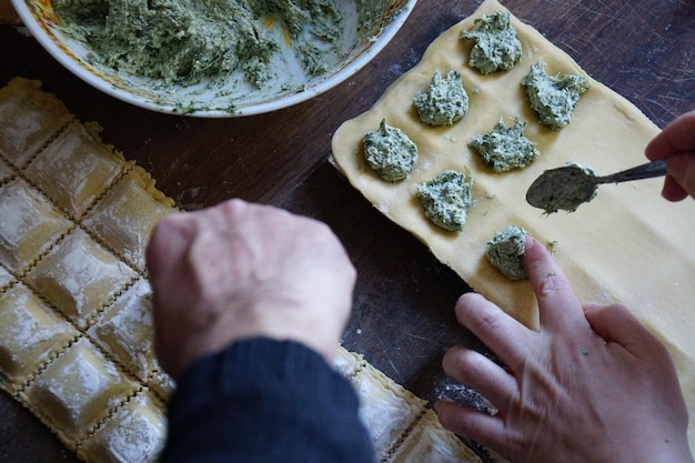 high angle view of person preparing food on table