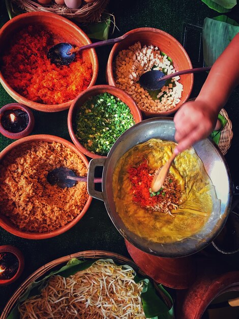 Photo high angle view of person preparing food