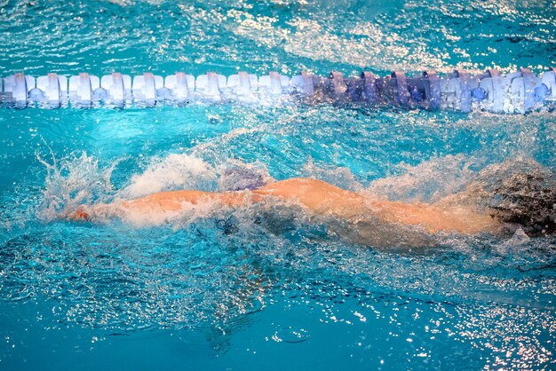 High angle view of person swimming in pool