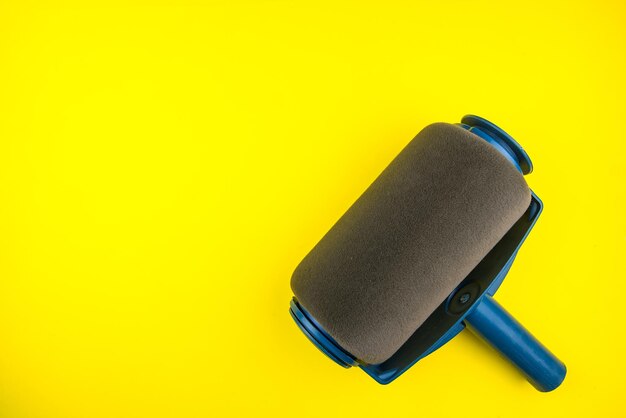 High angle view of piano against yellow background