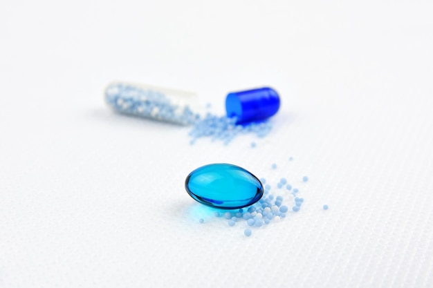 high angle view of pills on white background