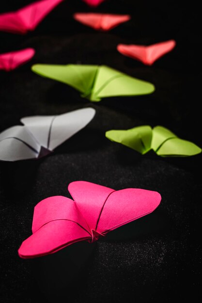 High angle view of pink flowers on paper