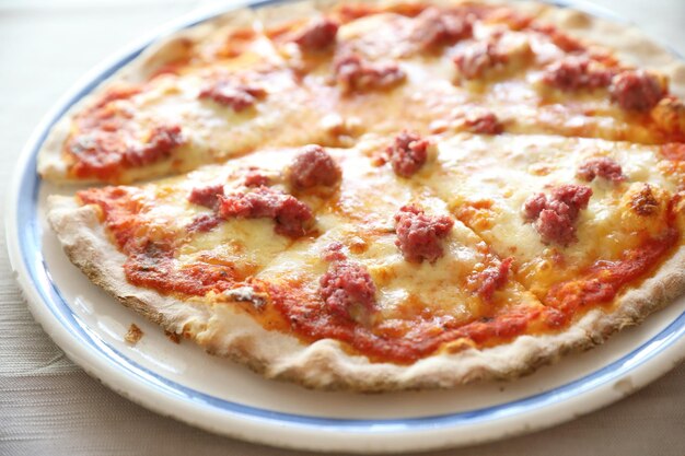 High angle view of pizza in plate on table