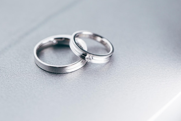 High angle view of platinum wedding rings on table