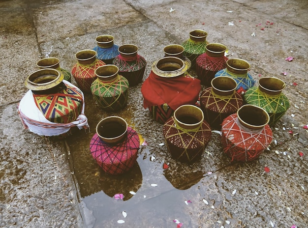 high angle view of pots on wet floor