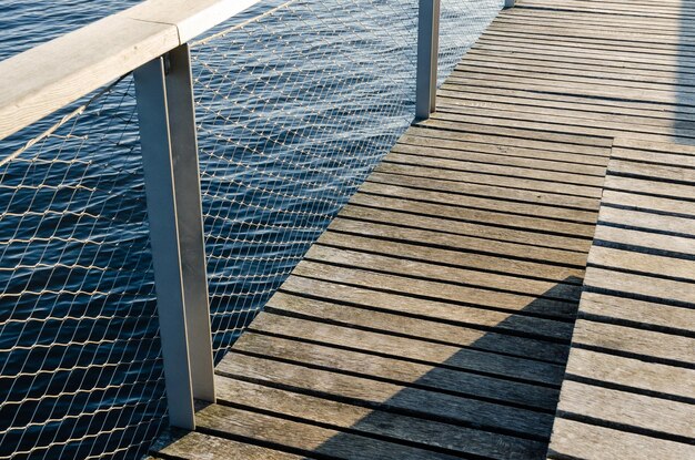 Photo high angle view of railing by footbridge