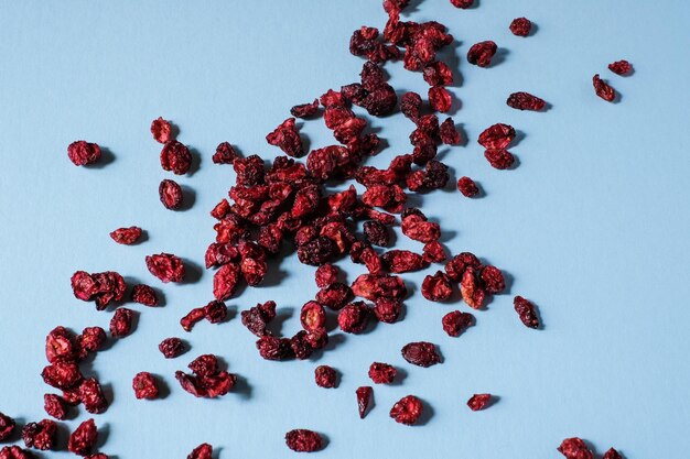 Photo high angle view of red berries over white background