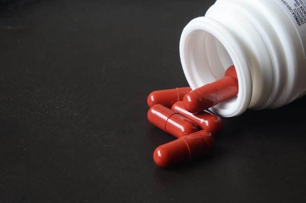 High angle view of red bottle on table