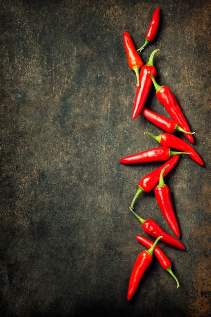 High angle view of red chili peppers on floor