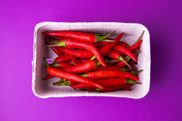 High angle view of red chili peppers on table