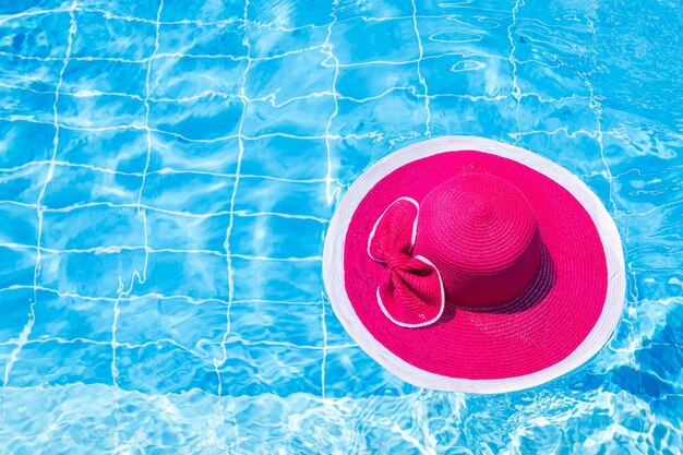 High angle view of red floating on swimming pool