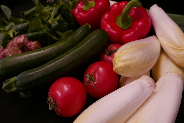 high angle view of red tomatoes and bell peppers