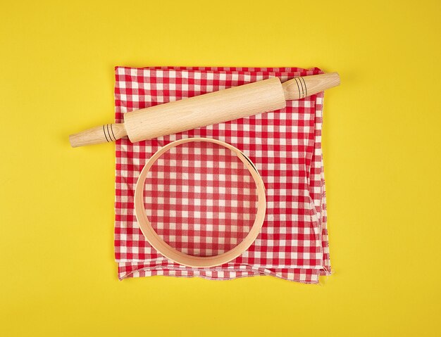 High angle view of red umbrella on yellow table