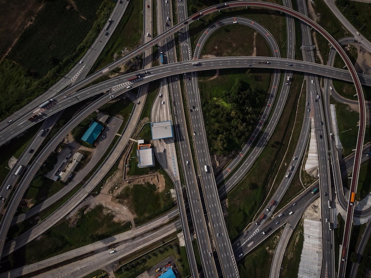 Photo high angle view of ring road industry connecting in the city transportation concept