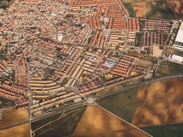 Photo high angle view of river amidst buildings in city