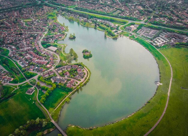 High angle view of river amidst cityscape