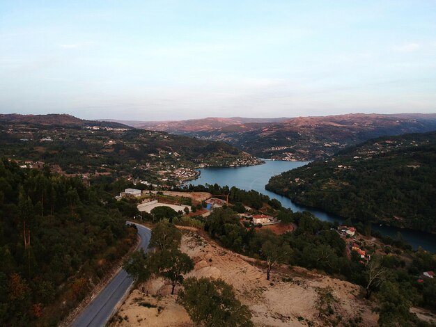 High angle view of river amidst landscape against sky