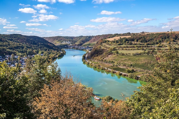 High angle view of river amidst trees against sky