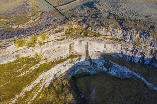 High angle view of river flowing through rock