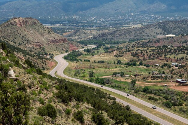 High angle view of road by mountain against sky