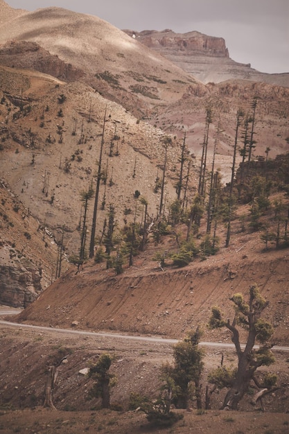 High angle view of road by mountains against sky