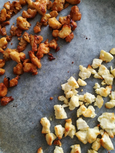 High angle view of roasted cheese on tissue paper