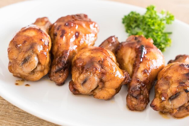 High angle view of roasted meat in plate on table