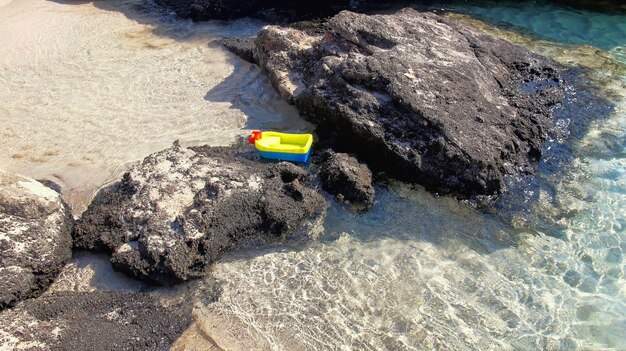 High angle view of rocks at beach