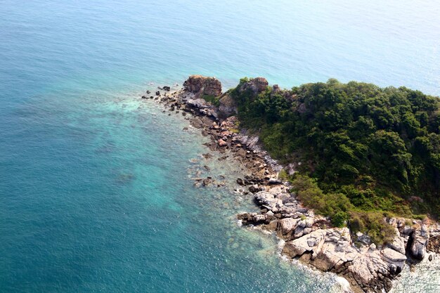 High angle view of rocks by sea