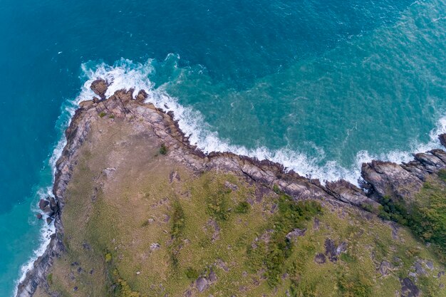 High angle view of rocks on sea shore