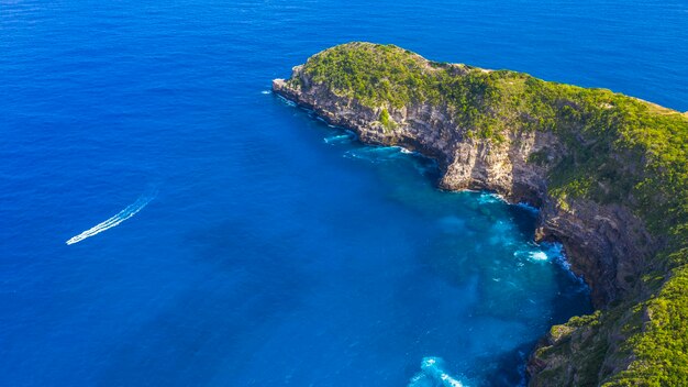 High angle view of rocks on sea shore