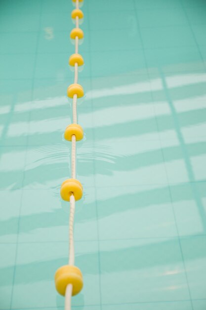 High angle view of ropes hanging from swimming pool