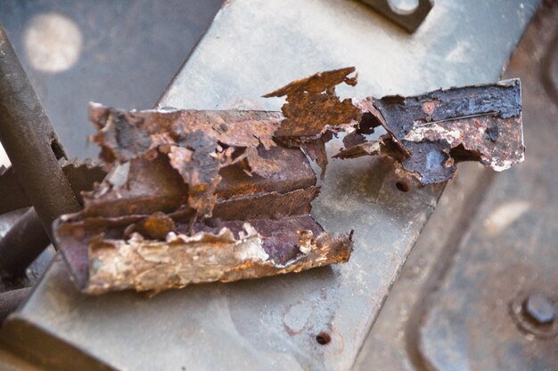 High angle view of rusty metal on table