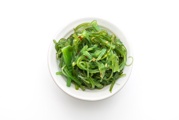 Photo high angle view of salad in bowl against white background