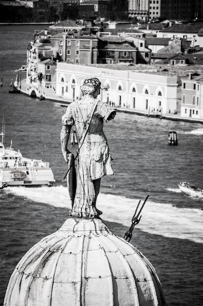 high angle view of san giorgio maggiore and grand canal against sky on sunny day in city
