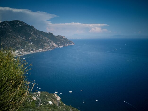 High angle view of sea against blue sky