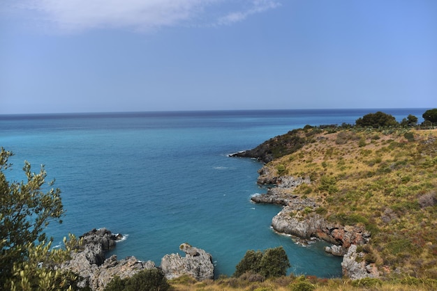 High angle view of sea against blue sky