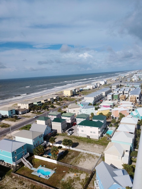 High angle view of sea and buildings against sky