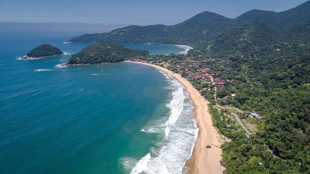 High angle view of sea and mountains against sky