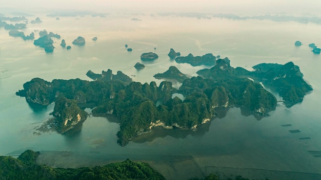 High angle view of sea and rocks against sky