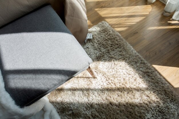 High angle view of seat on rug at home