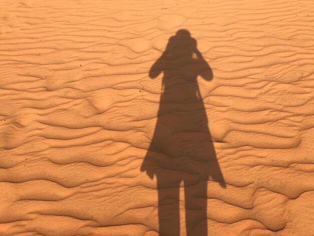 High angle view of shadow on sand