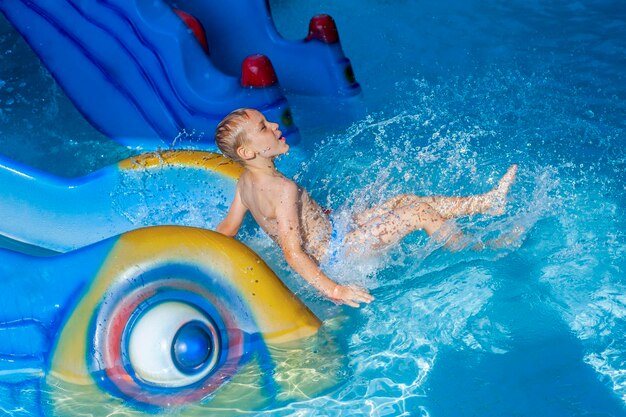 High angle view of shirtless man in swimming pool