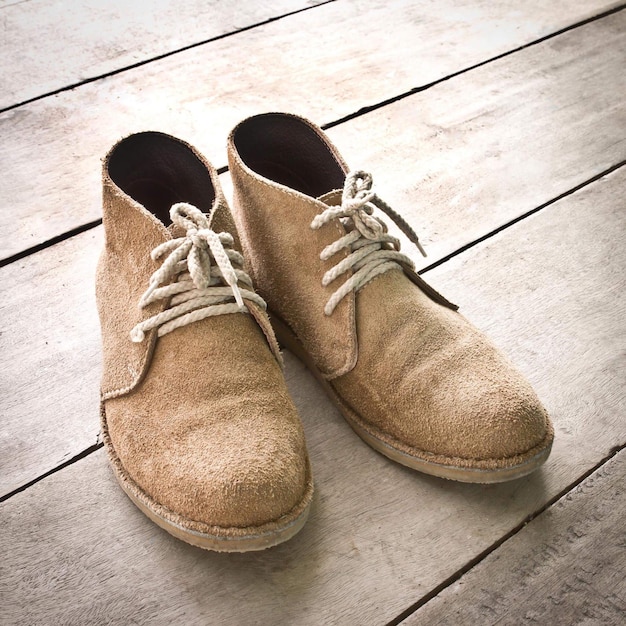 Photo high angle view of shoe on hardwood floor