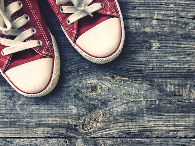 High angle view of shoes on wooden table