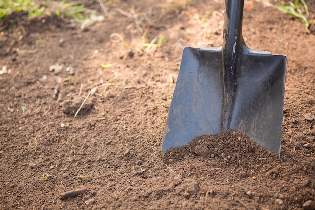 High angle view of shovel on dirt